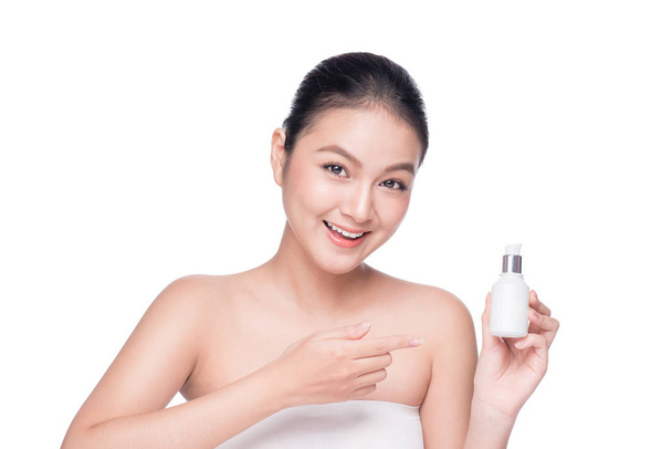 woman holding moisturizing serum bottle - Photo, Image