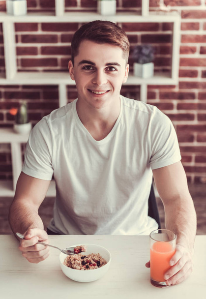 Guy with healthy food - Фото, изображение