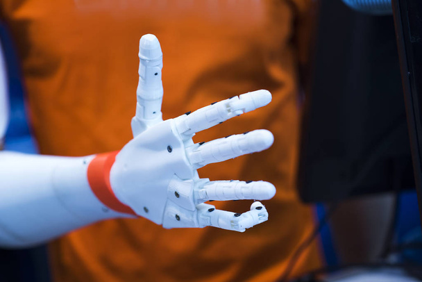 plastic robot hand with open palm gesture - Fotografie, Obrázek