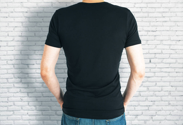 Casual guy in black shirt back - Photo, Image