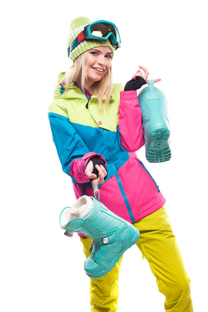 woman in ski suit with snow boots - Photo, Image