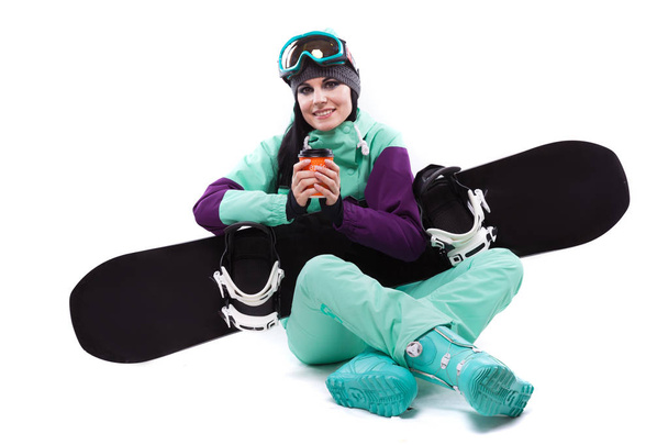 nő a ruha lila sí snowboard - Fotó, kép