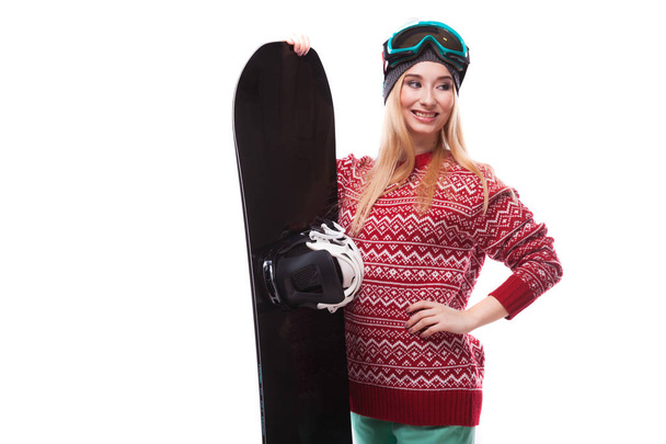 femme en pull rouge avec snowboard
 - Photo, image