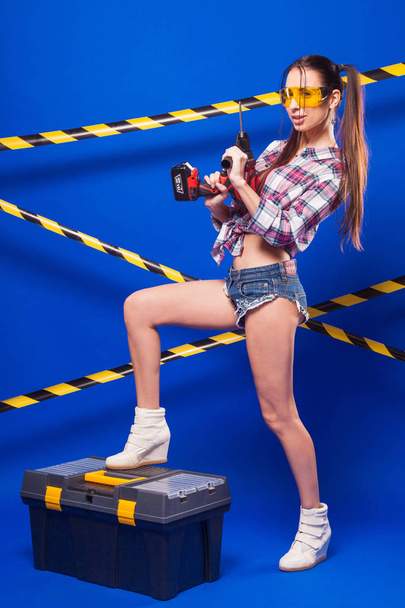 brunette woman in shorts and goggles - Photo, Image
