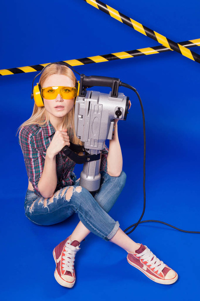 blonde woman in yellow builder glasses - Photo, Image