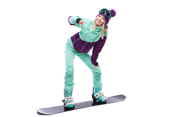 mulher de terno de esqui passeios snowboard
 - Foto, Imagem
