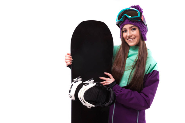 jolie femme en costume de ski avec snowboard
 - Photo, image