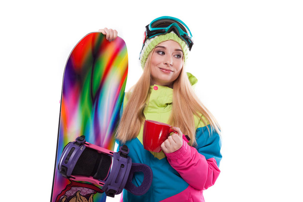 femme en tenue de ski avec snowboard
 - Photo, image