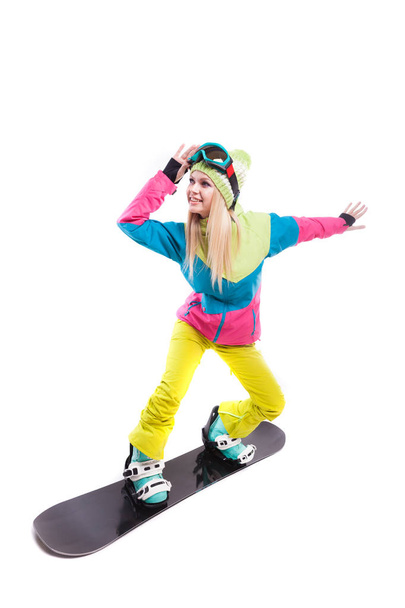 mujer en traje de esquí paseos snowboard
 - Foto, Imagen