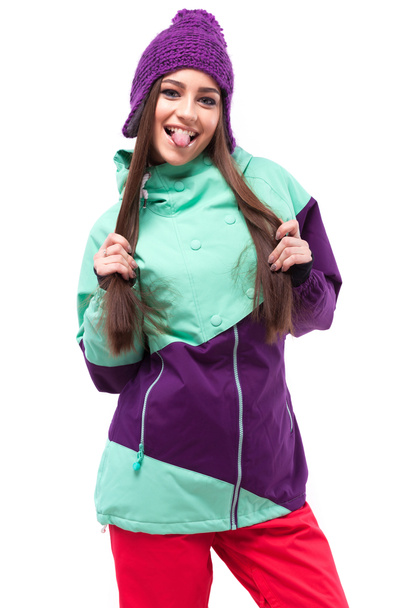 young woman in purple ski outfit - Photo, Image