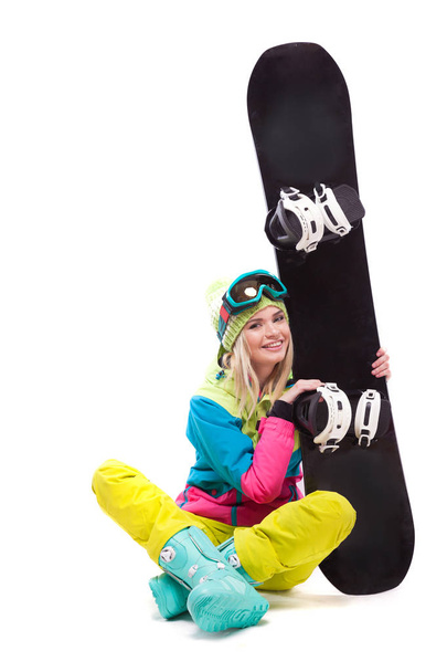 beautiful young woman with snowboard - Photo, Image