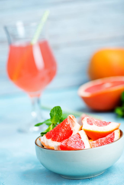 juice and fresh grapefruit  - Fotoğraf, Görsel