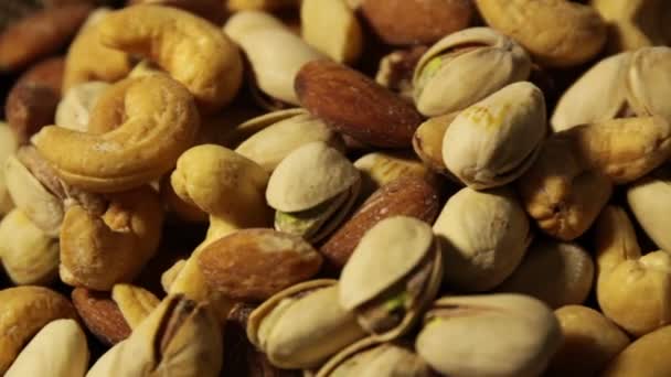 Fondo de frutos secos con un surtido mixto de semillas
  - Metraje, vídeo