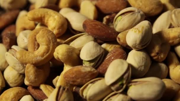 Fondo de frutos secos con un surtido mixto de semillas
  - Imágenes, Vídeo