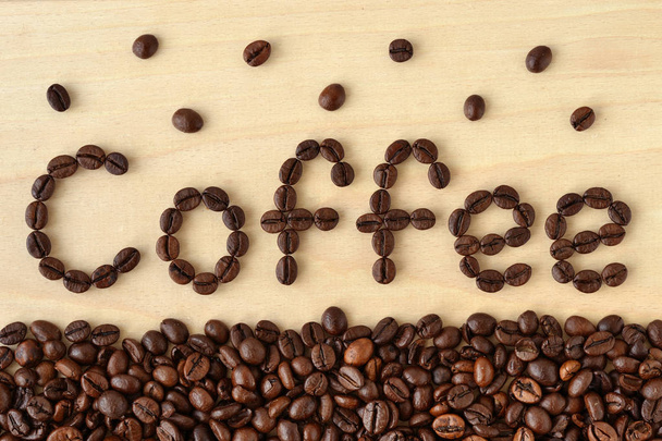 Kahvi kirjoitettu kahvipapuja
 - Valokuva, kuva