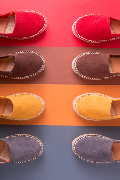 Espadrilles on multicolor background. Top view. Four pairs. - Valokuva, kuva