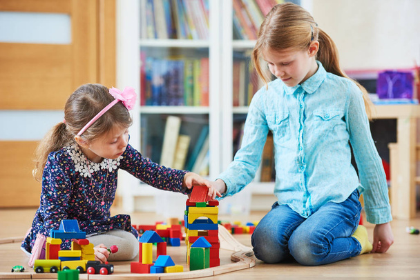 children playing with blocks indoors - Photo, Image