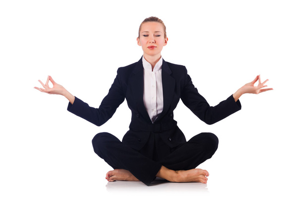 Young businesswoman meditating on the white - Photo, Image