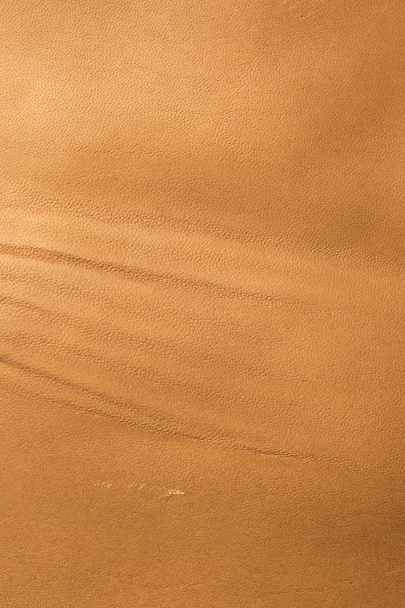 light brown leather background texture and background.  - Foto, Bild