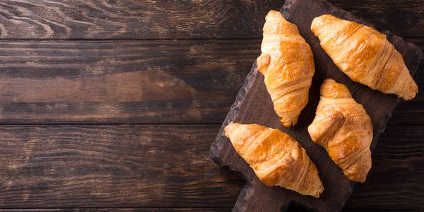 Fresh mini croissants - Фото, изображение