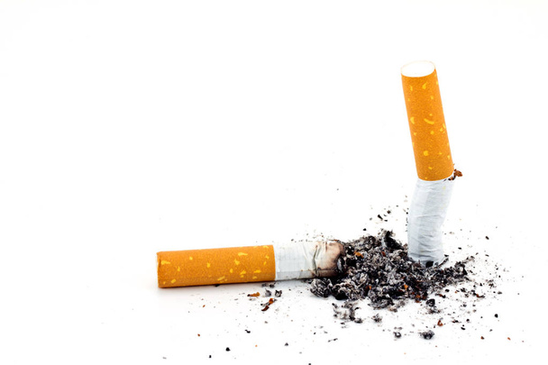 Single cigarette butt with ash isolated on white background  - Photo, Image