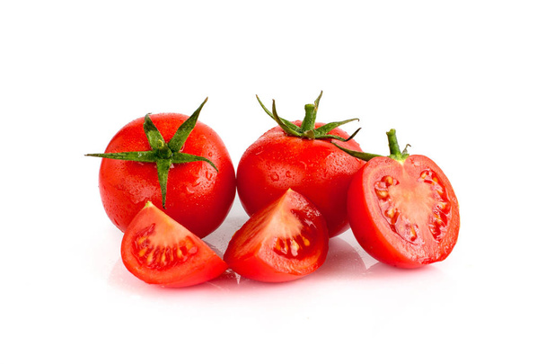 Tomatoes on the white isolated background - Foto, imagen