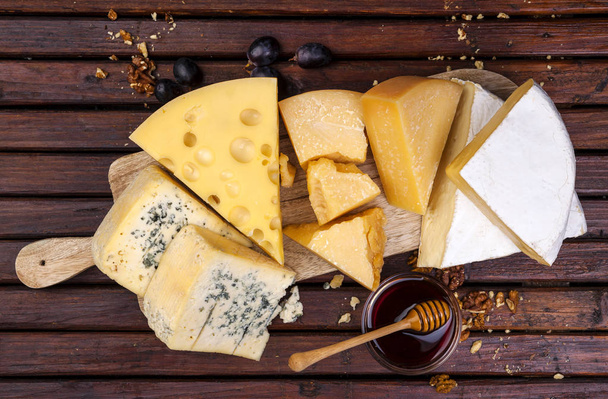 Cheese board. Various types of cheese. Top view - Valokuva, kuva