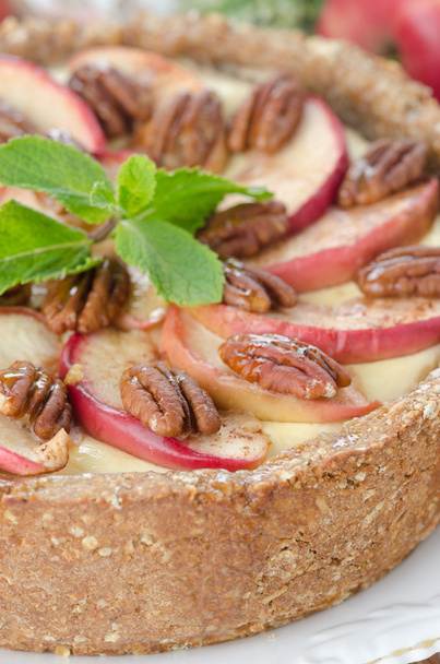Cheesecake with apples and caramelized pecans closeup selective - Фото, зображення