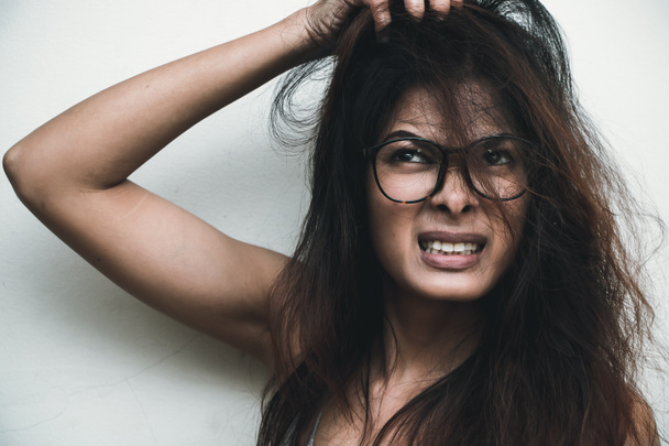 Young woman itchy scalp - Fotó, kép