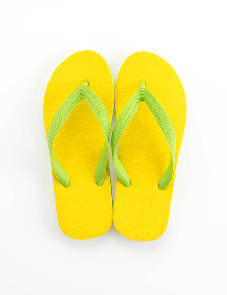 Rubber slippers on white background - Foto, afbeelding