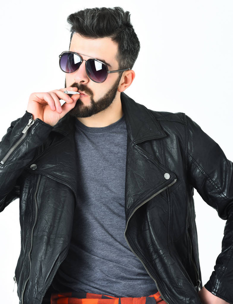 Bearded man, caucasian hipster with moustache smoking cigarette - Fotó, kép