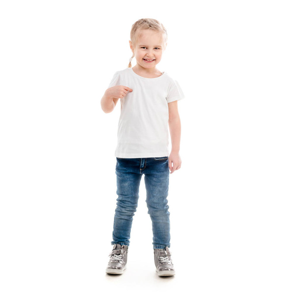 Tiny girl standing pointing at herself, isolated - Φωτογραφία, εικόνα