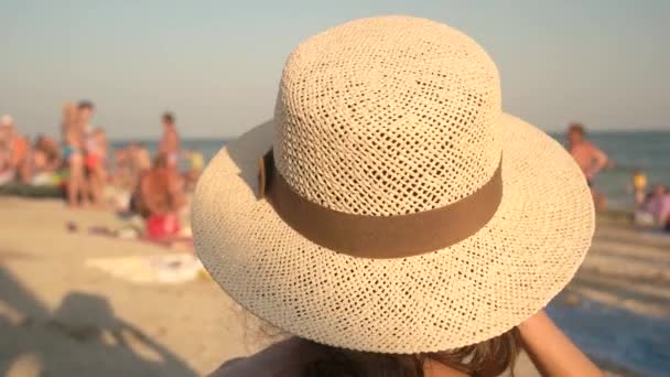 Lady in hat, beach background. - Footage, Video
