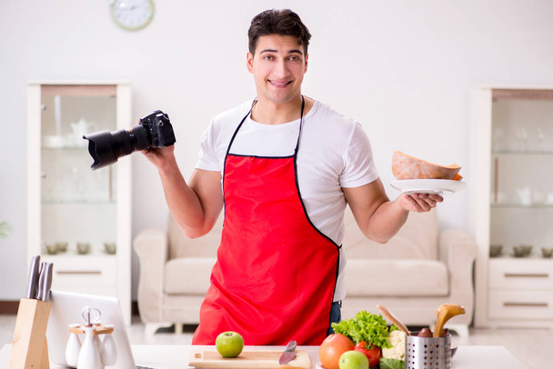 Food photographer taking photos in kitchen - Photo, Image