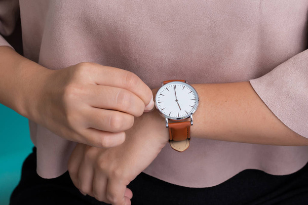 Woman with leather watch - 写真・画像