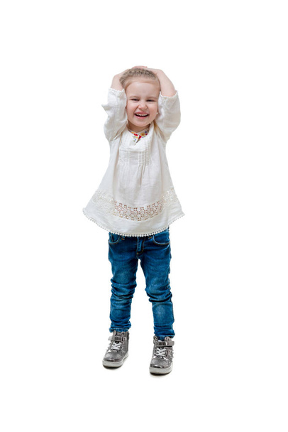 laughing kid in white sweater, isolated - Photo, image