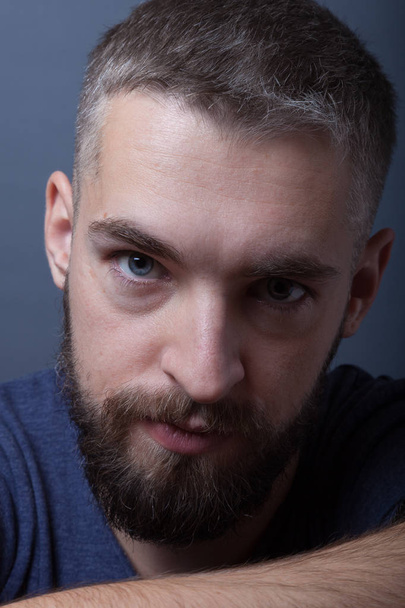 Portrait of a young man with a beard - Fotografie, Obrázek