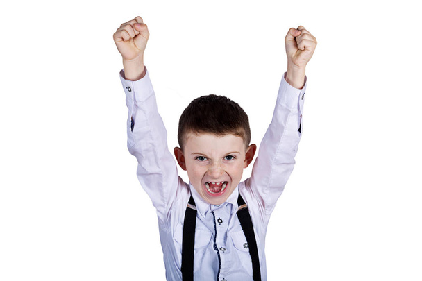 Excited Surprised  little boy holding his fist up - Φωτογραφία, εικόνα