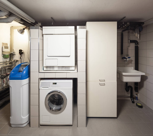Basement with washing machine - Фото, изображение