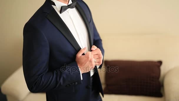 The jacket on the man is close-up. The bridegroom at the wedding - Footage, Video
