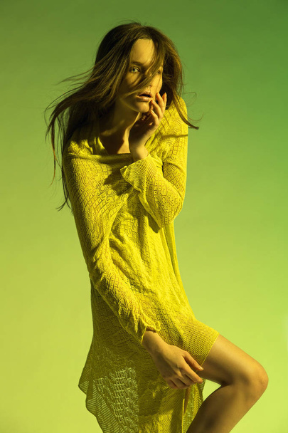 Beautiful girl, model in a photo studio with color filters.  - Fotoğraf, Görsel