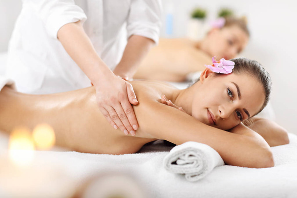  women getting massage in spa - Photo, Image