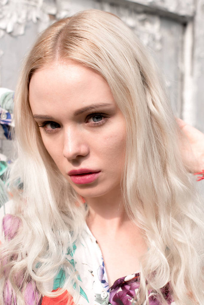 Young european blond woman outdoors portrait. Bright white colors. - Fotoğraf, Görsel