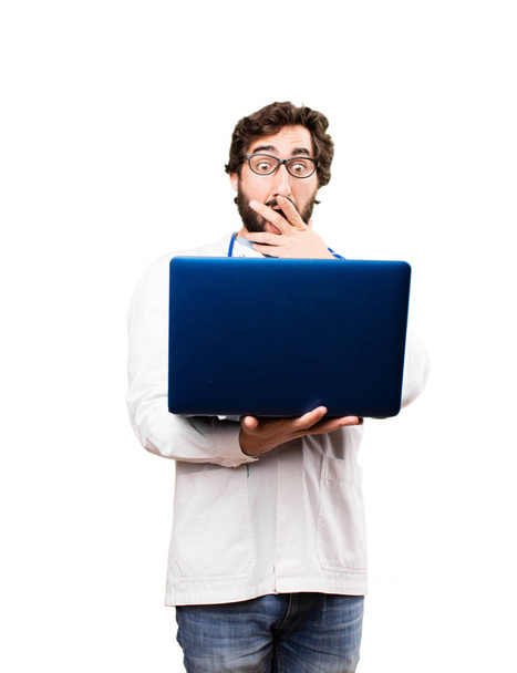 young doctor man with a laptop - Photo, image