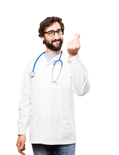 young doctor man with money sign - Foto, immagini