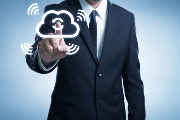 Businessman touching the cloud - Photo, Image