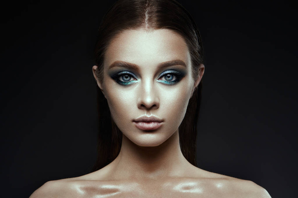 Fashion model Woman with fantasy make up. Long blowing brown hair. - 写真・画像