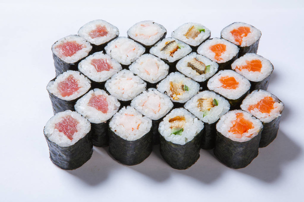 A plate with different kinds of sushi and rolls - Φωτογραφία, εικόνα