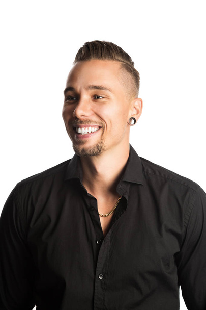 Smiling attractive man in black clothes - Foto, imagen