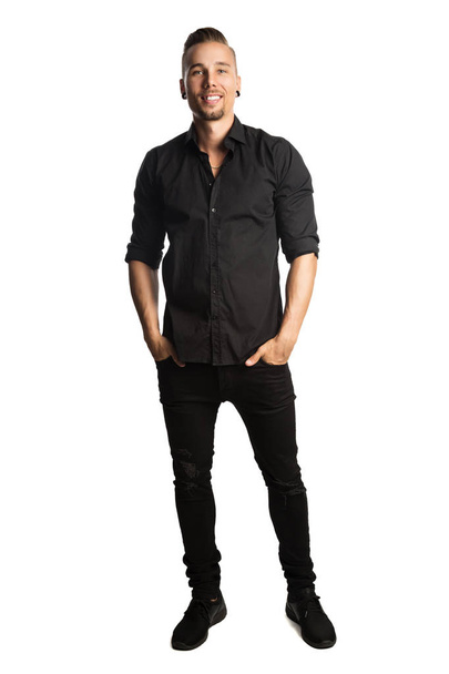 Smiling attractive man in black clothes - Фото, изображение